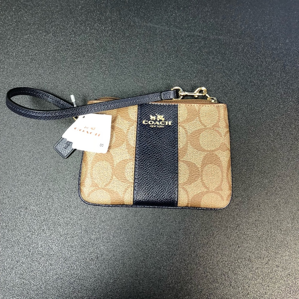 Coach signature navy wristlet brand new with tags